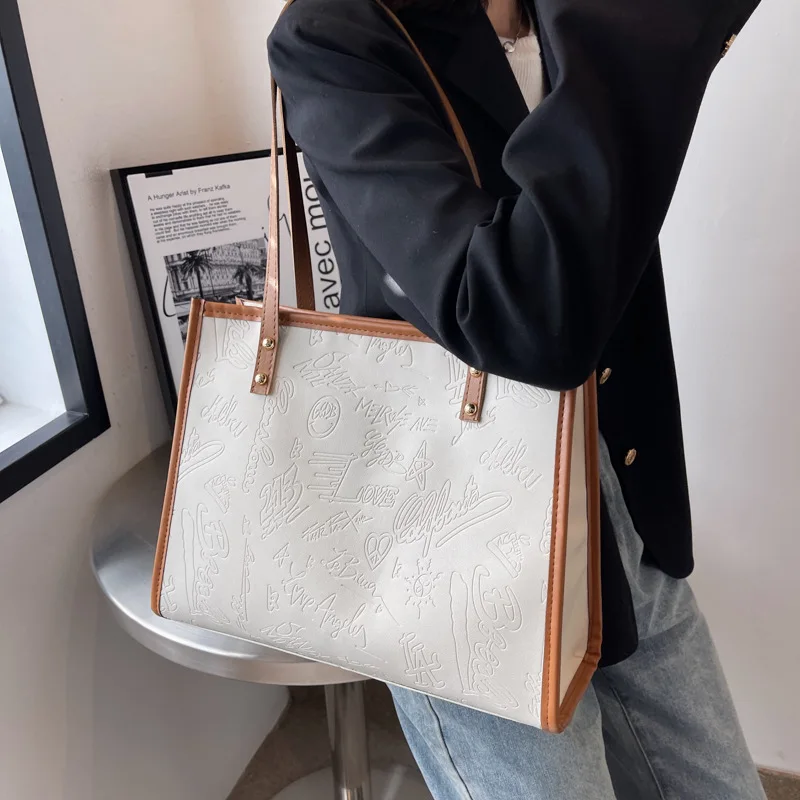 Large Capacity Bag Women's Autumn and Winter 2023 New Fashion and Simple shoulder Bag One Shoulder Tote Bag
Large Capacity Bag Women's Autumn and Winter 2023 New Fashion and Simple shoulder Bag One Shoulder Tote Bag