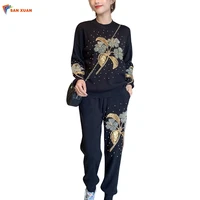 Autumn flower embroidered beaded fashion casual long sleeve top and pencil pants customizable knitted women fall two piece sets
Autumn flower embroidered beaded fashion casual long sleeve top and pencil pants customizable knitted women fall two piece sets