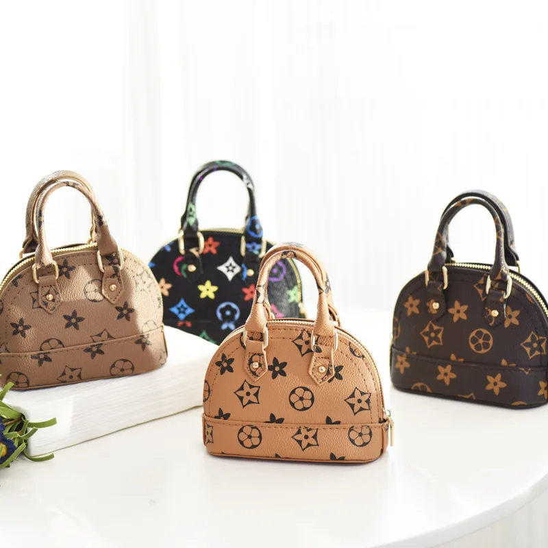 2021New Style Designer Little Girl Handbags Fashion Printing Kid Purses and Luxry Handbags Mini Coin Purse, 4 colors
2021New Style Designer Little Girl Handbags Fashion Printing Kid Purses and Luxry Handbags Mini Coin Purse, 4 colors