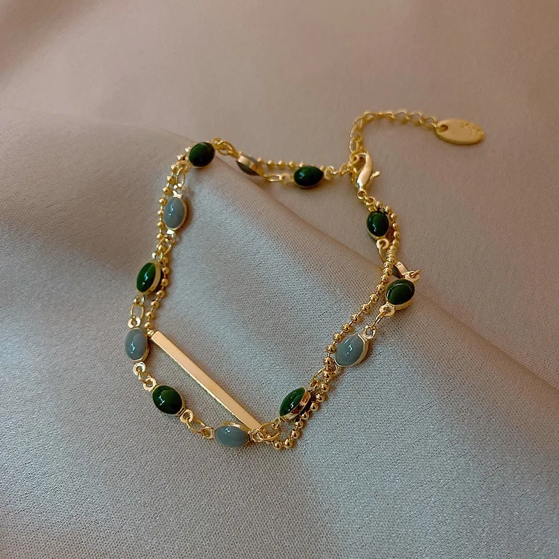 Korean Exquisite Double Layered Emerald Beads Bracelet Gold Plated Beaded Chain Bar Charm Bracelet For Women
Korean Exquisite Double Layered Emerald Beads Bracelet Gold Plated Beaded Chain Bar Charm Bracelet For Women
