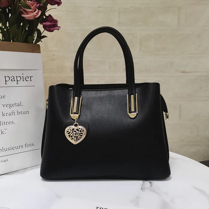 Top quality custom made bags women handbags vegan black tote bag dropshipping fashion germany handbag
Top quality custom made bags women handbags vegan black tote bag dropshipping fashion germany handbag