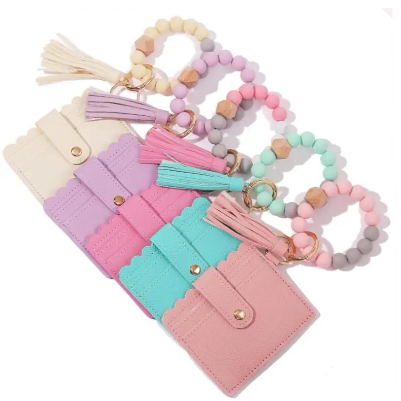 Silicone Beaded Wristlet Key Chains Jewelry Tassel Bangle Key Ring Holder Card Bag PU Leather Bracelet Wallet Key Ring
Silicone Beaded Wristlet Key Chains Jewelry Tassel Bangle Key Ring Holder Card Bag PU Leather Bracelet Wallet Key Ring