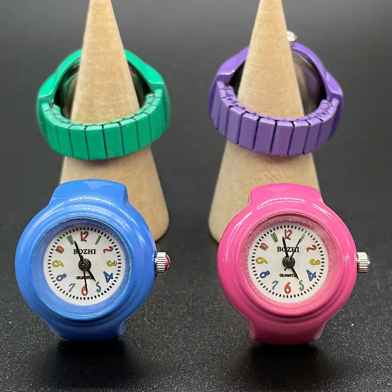HOVANCI Wholesale Fashion Design Teenager Small Finger Watch Adjustable Free Size Vintage Punk Colored Mini Ring Watch
HOVANCI Wholesale Fashion Design Teenager Small Finger Watch Adjustable Free Size Vintage Punk Colored Mini Ring Watch