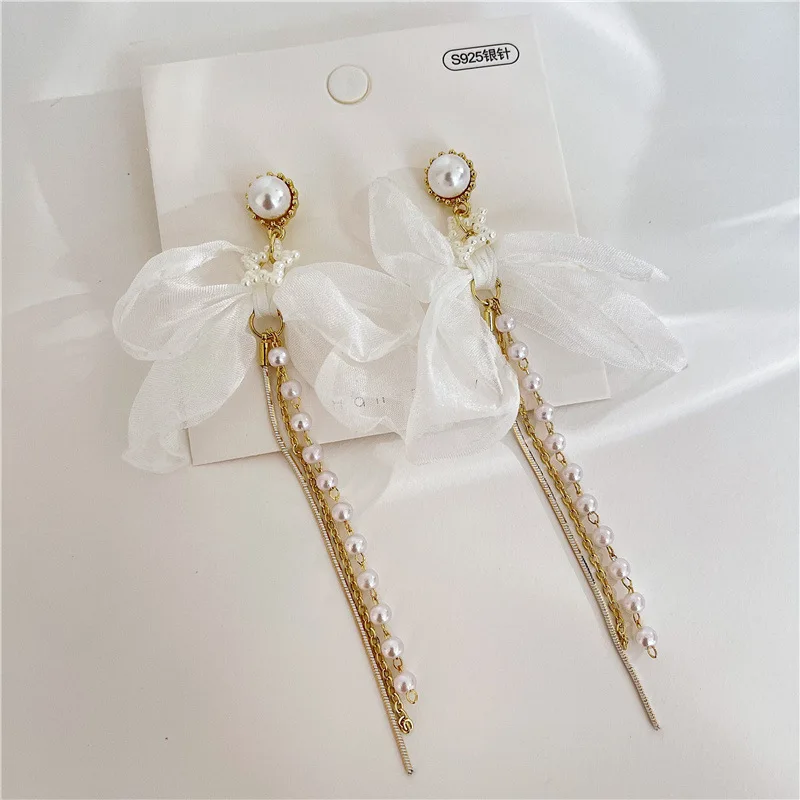 Vershal A3-218 French Style Elegant Five-pointed Star Pearl Beads White Fabrics Bowknot Tassel Earrings
Vershal A3-218 French Style Elegant Five-pointed Star Pearl Beads White Fabrics Bowknot Tassel Earrings