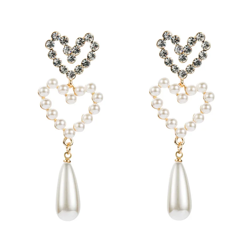 European, American and Korean fashion pearl alloy diamond double heart-shaped women's long earrings
European, American and Korean fashion pearl alloy diamond double heart-shaped women's long earrings