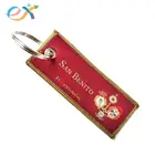 professionally cheap fabric woven embroidered keyrings custom