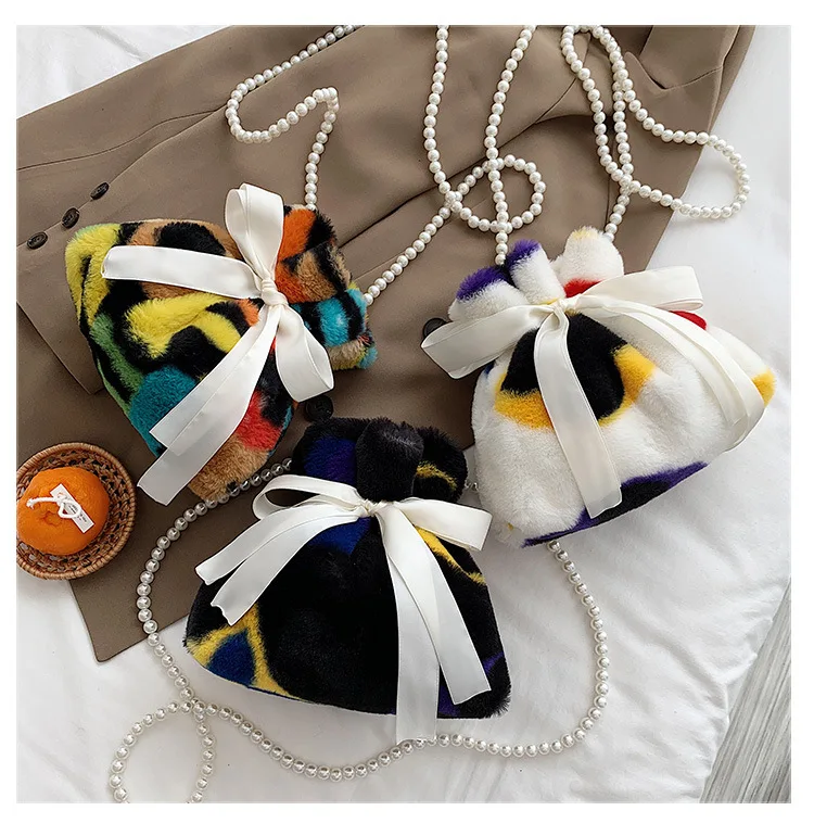 Rainbow colorful large capacity pearls chain bowknot handbag women plush shoulder bag, As show
Rainbow colorful large capacity pearls chain bowknot handbag women plush shoulder bag, As show