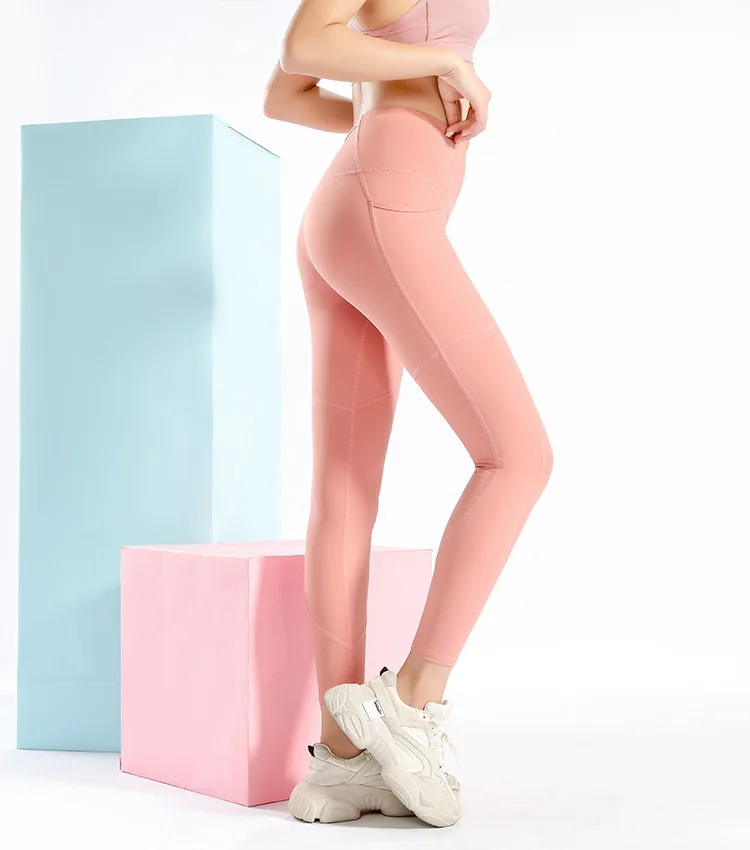 2021 New Naked Feeling Cuff Hollow Side Pockets Women High Waist Varley Yoga Pants with pockets
2021 New Naked Feeling Cuff Hollow Side Pockets Women High Waist Varley Yoga Pants with pockets