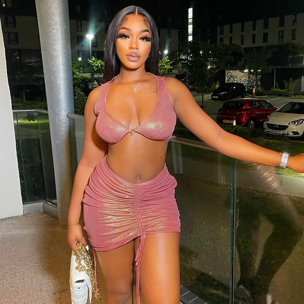 2022 Summer laser pink Two Piece skirt Set crop top and bandage mini skirt 2 piece club outfits set sexy streetwear women lady
2022 Summer laser pink Two Piece skirt Set crop top and bandage mini skirt 2 piece club outfits set sexy streetwear women lady
