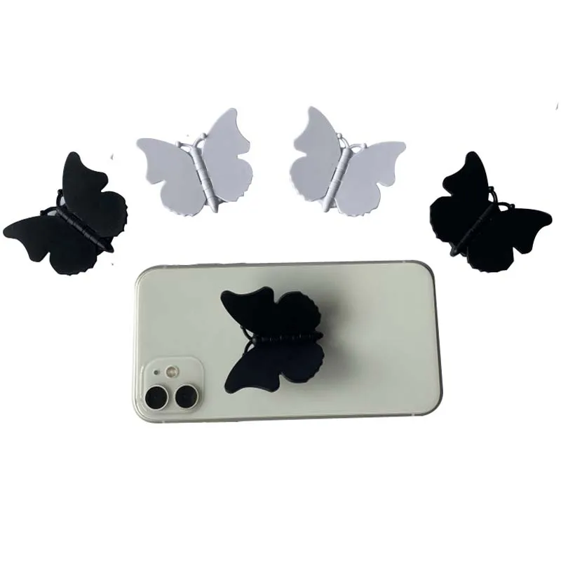 Rotating Butterfly mobile phone holder butterfly folding stretch bracket DIY rotating phone finger ring holder with sticker, Black white
Rotating Butterfly mobile phone holder butterfly folding stretch bracket DIY rotating phone finger ring holder with sticker, Black white