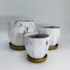 /product-detail/elegant-matt-marble-glazed-high-quality-clay-set-three-terra-cotta-flower-pots-and-planters-for-plants-62309431311.html