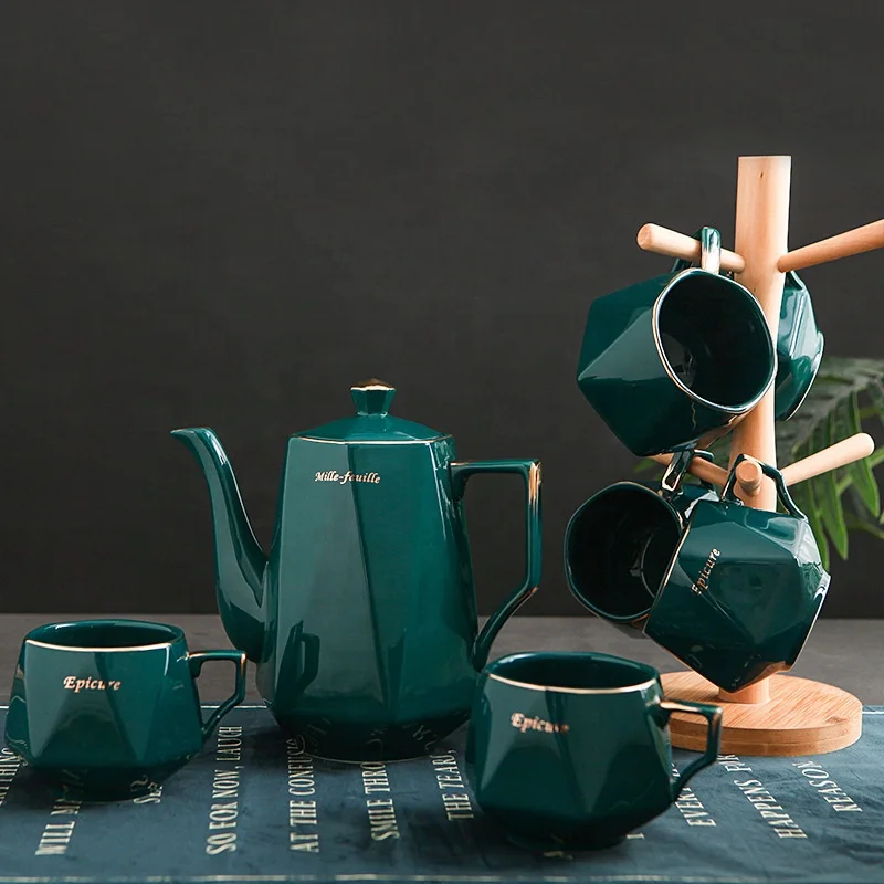 Malachite green gilt pot cup set Household ceramic cup set living room
Malachite green gilt pot cup set Household ceramic cup set living room