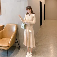 Wholesale new arrival round neck office lady cable knitted long sweater dress with belt
Wholesale new arrival round neck office lady cable knitted long sweater dress with belt