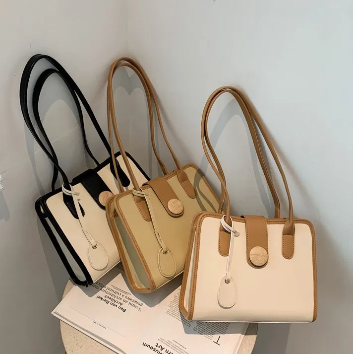 2021 New PU material simple button single shoulder bag wholesale girls shopping wallet and phone handbags, 3 colors
2021 New PU material simple button single shoulder bag wholesale girls shopping wallet and phone handbags, 3 colors