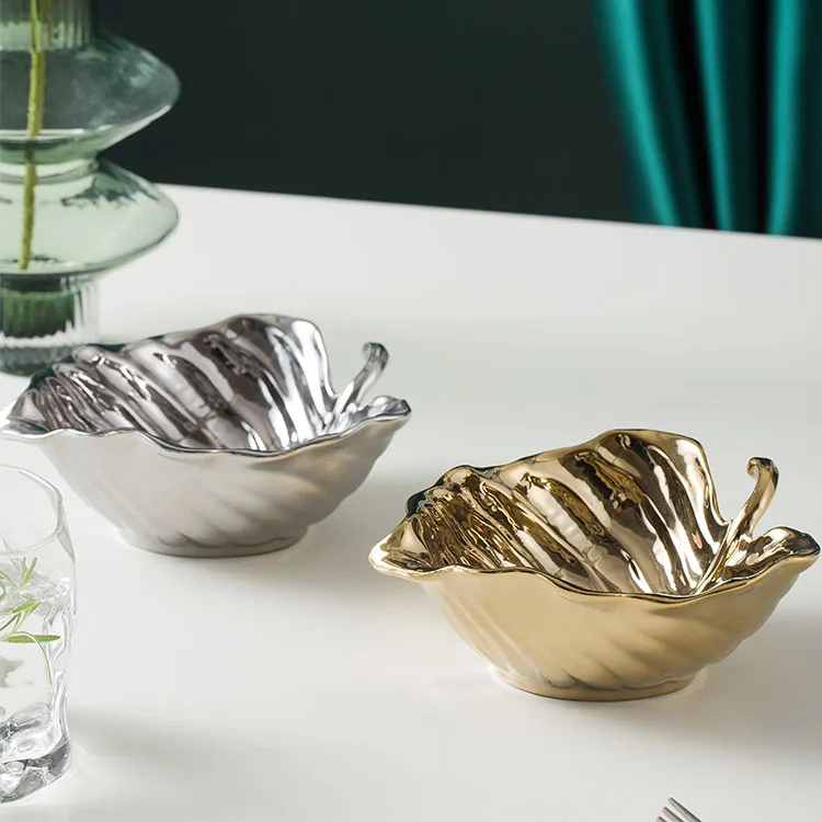 Hot selling gold and silver leaf shape european style cheap bulk restaurant fruit tray nordic ceramic dinner plates
Hot selling gold and silver leaf shape european style cheap bulk restaurant fruit tray nordic ceramic dinner plates
