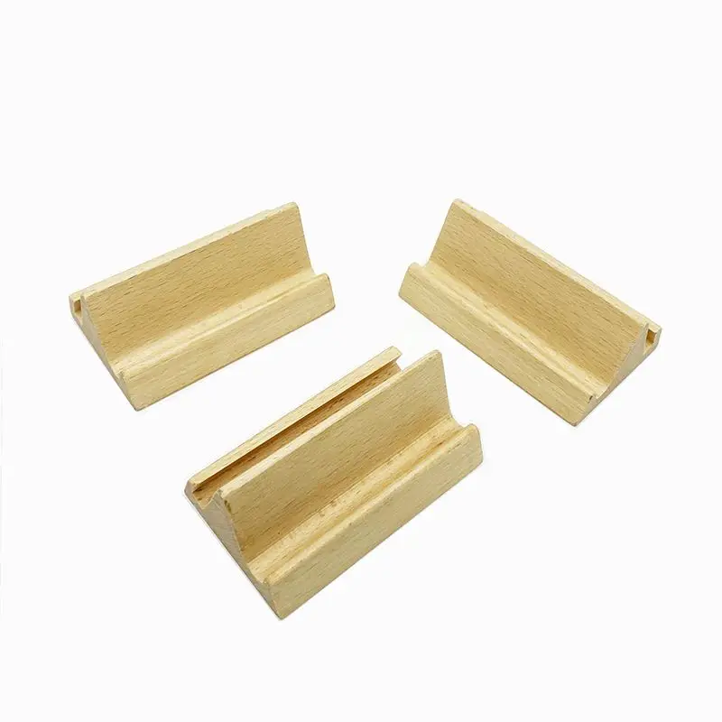 Wooden cellphone holder stand TOLag wooden mobile phone base, Wood color 
Wooden cellphone holder stand TOLag wooden mobile phone base, Wood color