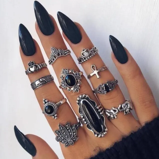 Jewelry European and American personality black gemstone elephant lotus crown cross 11 - piece ring, Silver
Jewelry European and American personality black gemstone elephant lotus crown cross 11 - piece ring, Silver