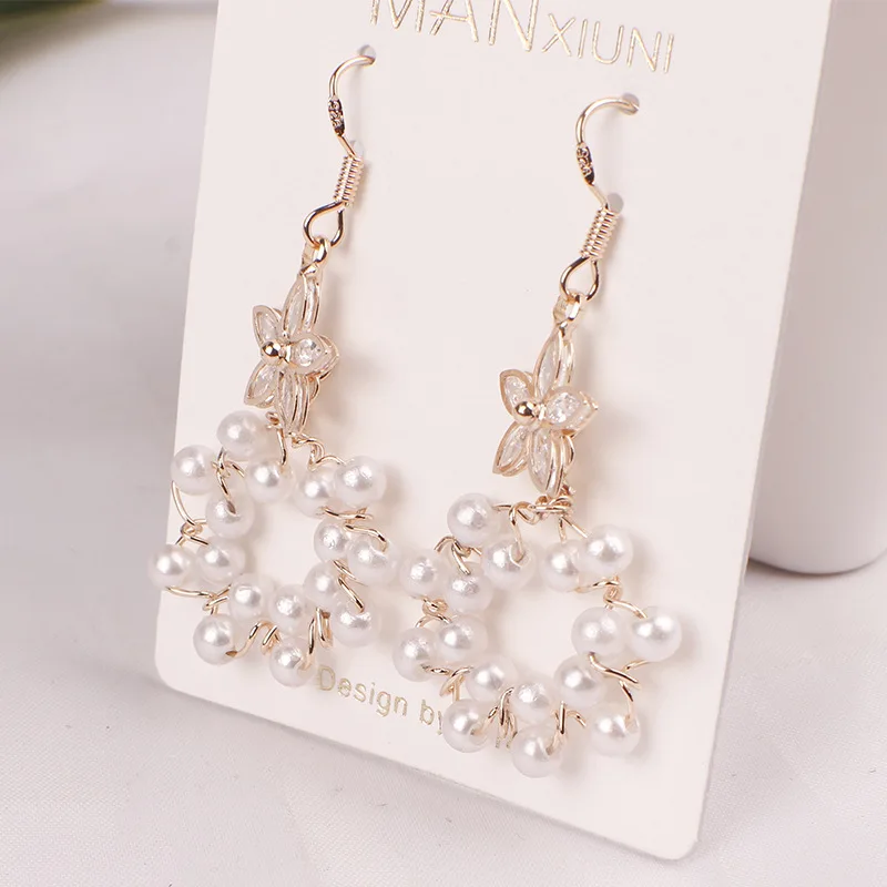 Hot Selling trendy Round Pearl Flower earrings personality fashion stud earrings
Hot Selling trendy Round Pearl Flower earrings personality fashion stud earrings