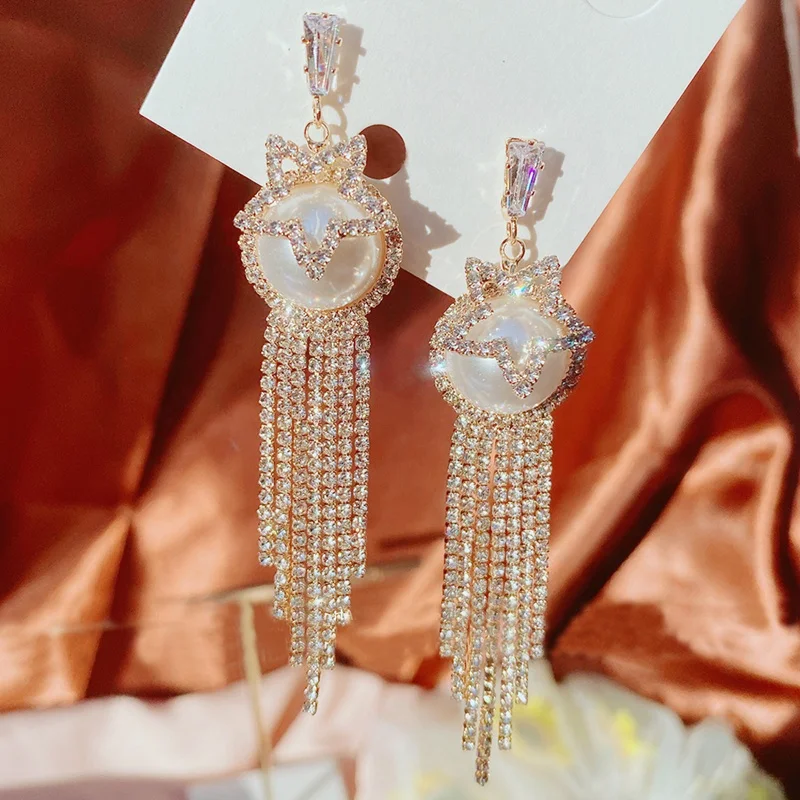 Fashion Korean Luxury Hollow Star Drop Earrings For Women Elegant Rhinestone Tassel Long Pendientes Party Jewelry
Fashion Korean Luxury Hollow Star Drop Earrings For Women Elegant Rhinestone Tassel Long Pendientes Party Jewelry