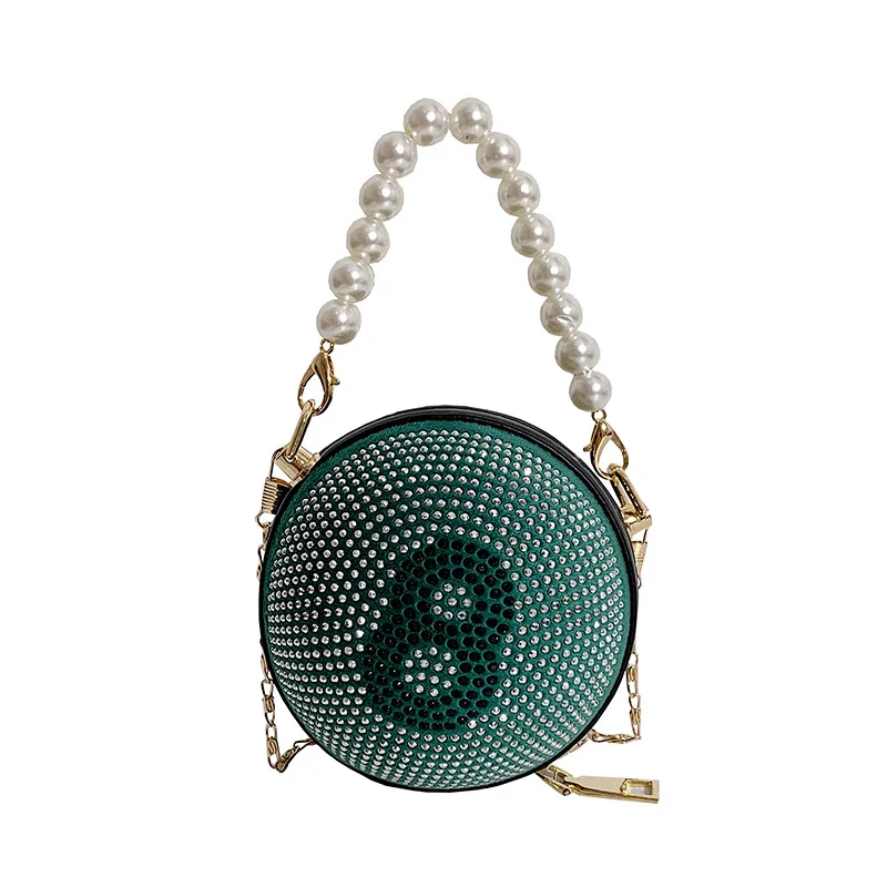 Personality round ball mini bag 2021 fashion rivet small pearl handle ladies crystal crossbody bag
Personality round ball mini bag 2021 fashion rivet small pearl handle ladies crystal crossbody bag