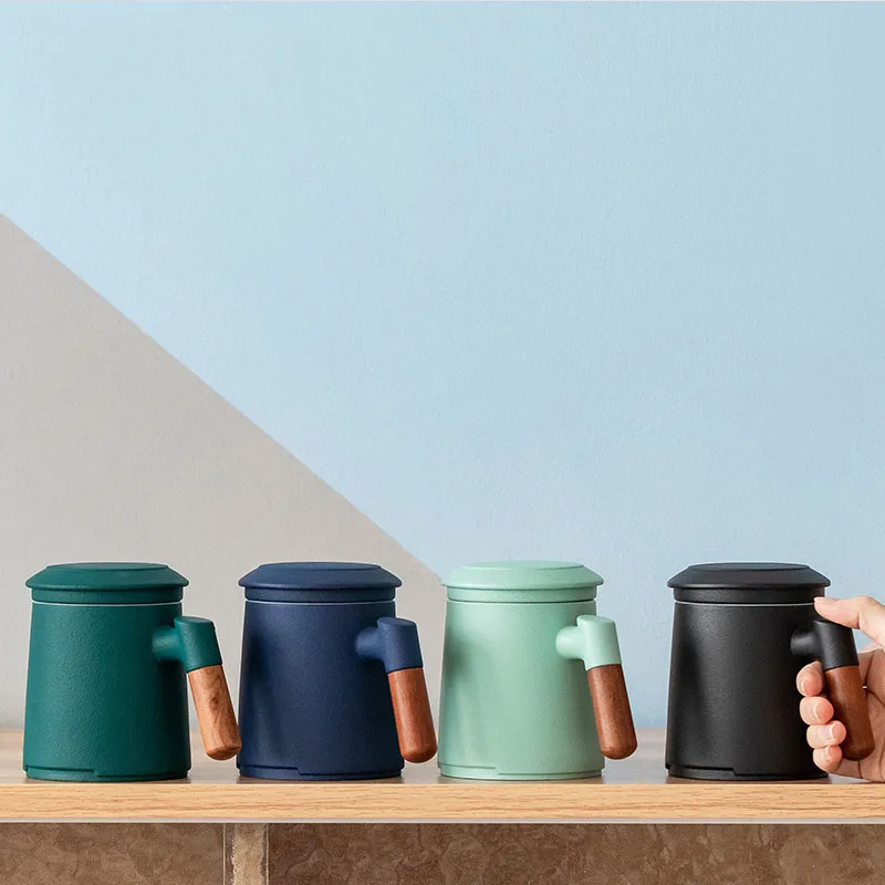 Custom Made Logo Ceramic Tea Cup With Wooden Handle Enamelled Mug with Infuser and Lid Personalized Tea Mug with Ceramic Filter, Black, green,blue,green
Custom Made Logo Ceramic Tea Cup With Wooden Handle Enamelled Mug with Infuser and Lid Personalized Tea Mug with Ceramic Filter, Black, green,blue,green
