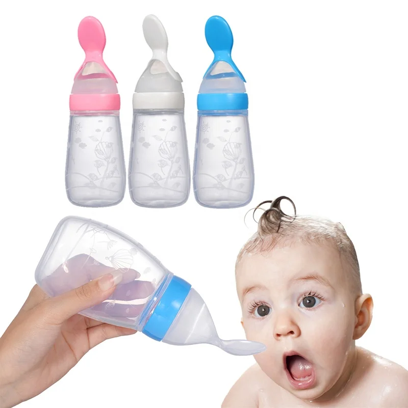 Silicone Baby Spoon feeder Baby bottle with spoon Squeeze Feeding Bottle 125 ml, White pink bule
Silicone Baby Spoon feeder Baby bottle with spoon Squeeze Feeding Bottle 125 ml, White pink bule