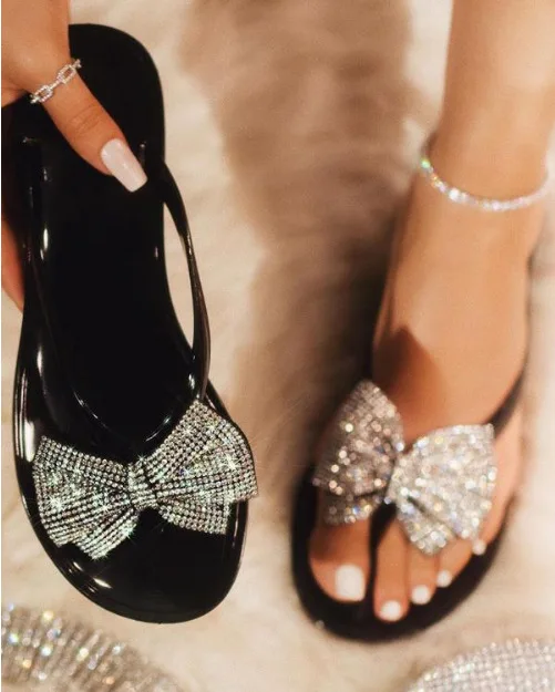 Spot for cross border independent net summer female bowknot slippers color drill flip-flops flat craft beach shoes, Black, transparent, pink, khaki
Spot for cross border independent net summer female bowknot slippers color drill flip-flops flat craft beach shoes, Black, transparent, pink, khaki