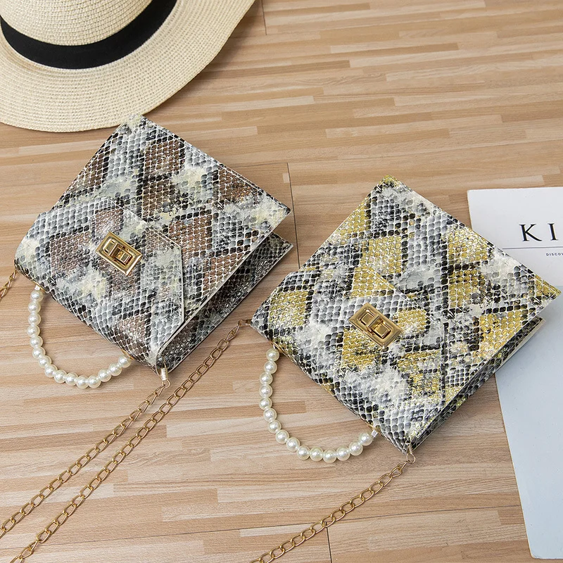 Snake Leather Women Handbag Purse Pearl Snake Fashion Luxury Lady Shoulder Crossbody Hand Bags Messenger New Arrive Bags
Snake Leather Women Handbag Purse Pearl Snake Fashion Luxury Lady Shoulder Crossbody Hand Bags Messenger New Arrive Bags