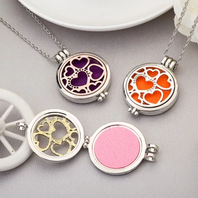 Latest Arrival Heart Locket Pendant Aromatherapy Necklace Heart Oil Diffuser Necklaces with 5 Refill Pads
Latest Arrival Heart Locket Pendant Aromatherapy Necklace Heart Oil Diffuser Necklaces with 5 Refill Pads