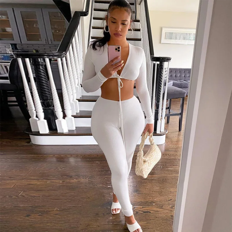 2022 spring summer new arrivals long sleeves V neck lace up crop top with leggings two piece pant set
2022 spring summer new arrivals long sleeves V neck lace up crop top with leggings two piece pant set