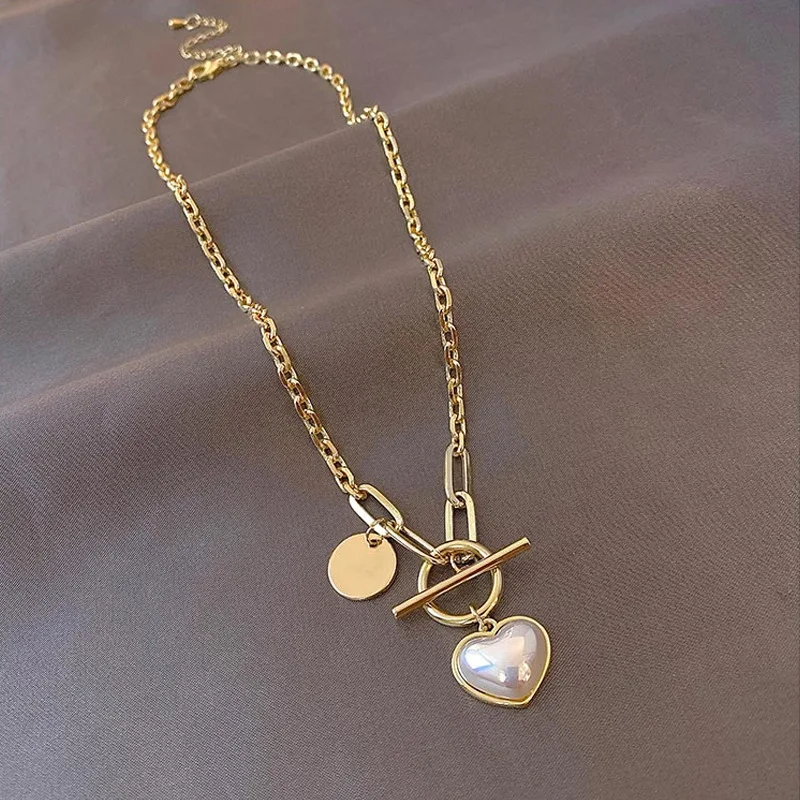 Women Fashion Jewelry Gold Plated Titanium Steel OT Buckle Heart Necklace Stainless Steel Heart Toggle Sweater Chain Necklace
Women Fashion Jewelry Gold Plated Titanium Steel OT Buckle Heart Necklace Stainless Steel Heart Toggle Sweater Chain Necklace