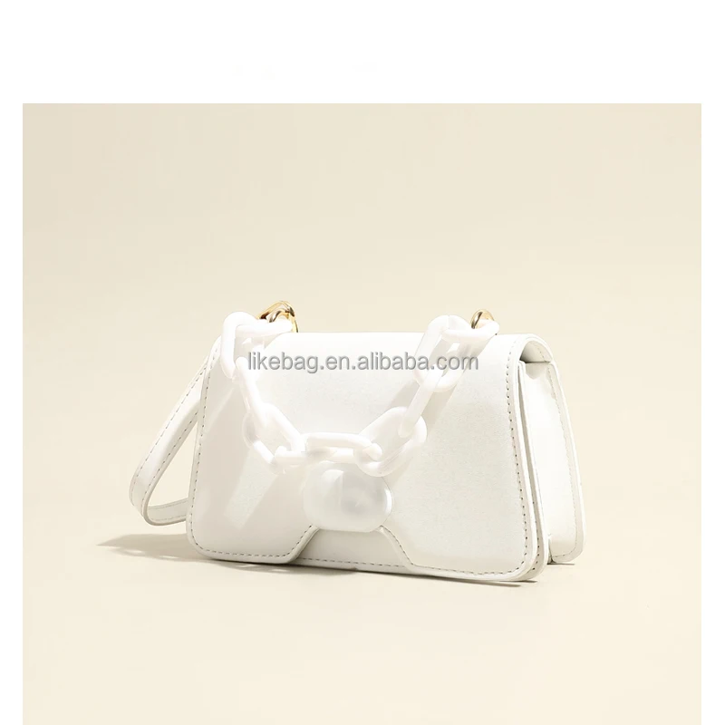LIKEBAG fashion new handbag trending button wholeasle pu leather shoulder handbags with acrylic chain
LIKEBAG fashion new handbag trending button wholeasle pu leather shoulder handbags with acrylic chain