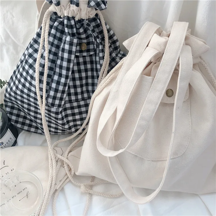 Japanese style custom canvas bag 2021 new drawstring single shoulder cloth lattice bag wholesale, Customized color
Japanese style custom canvas bag 2021 new drawstring single shoulder cloth lattice bag wholesale, Customized color