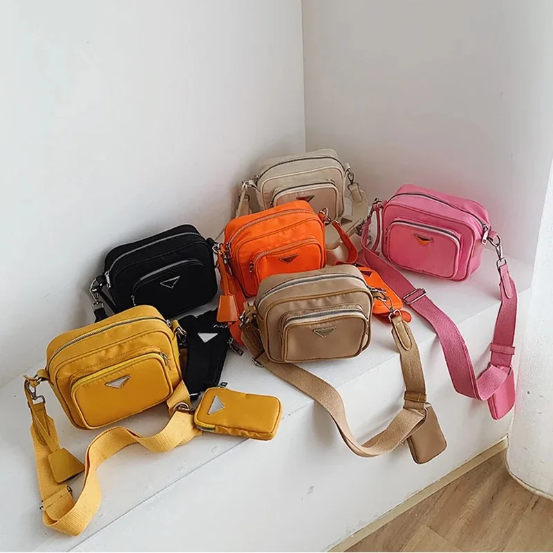 2020 Summer Purse Wide Shoulder strap Messenger bag women handbags Colorful purses Nylon handbags, 6 colors
2020 Summer Purse Wide Shoulder strap Messenger bag women handbags Colorful purses Nylon handbags, 6 colors