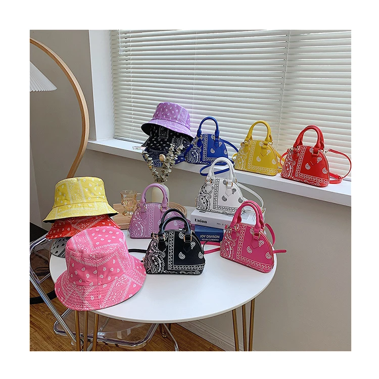 New Design Cashew Flower Bandana Women Hats and Purses Sets Shell Totes Handbags Branded Ladies Matching Hat Camisole Suit Bolsa
New Design Cashew Flower Bandana Women Hats and Purses Sets Shell Totes Handbags Branded Ladies Matching Hat Camisole Suit Bolsa