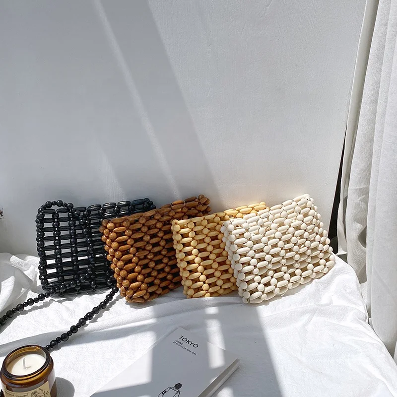 Korean version Niche design Bead bag 2021 Summer small and fresh Wood Mini bag Fashion hipster Sling Bag
Korean version Niche design Bead bag 2021 Summer small and fresh Wood Mini bag Fashion hipster Sling Bag