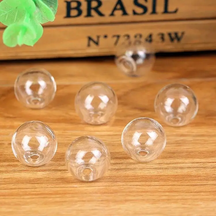 Empty Glass globe Ball Charms pendants vials orbs Bottles clear Globe Glass wish Bottle jars bubble Pendant round ball with hole
Empty Glass globe Ball Charms pendants vials orbs Bottles clear Globe Glass wish Bottle jars bubble Pendant round ball with hole