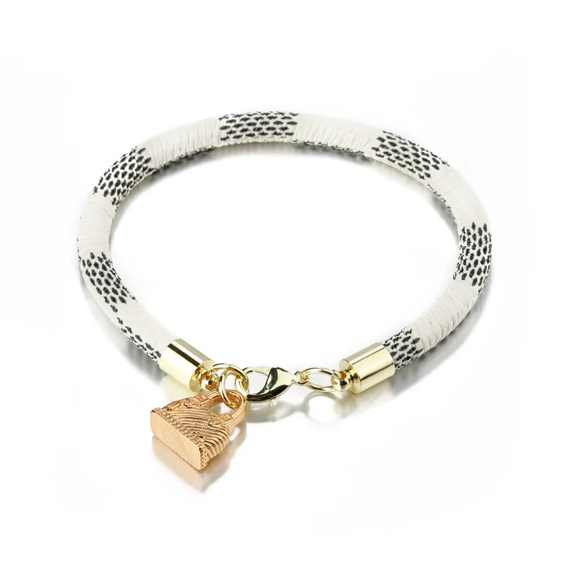 New Arrival Gold Plated Bag Shape Pendant PU Leather Snake Pattern Lobster Clasp Bracelet For Female
New Arrival Gold Plated Bag Shape Pendant PU Leather Snake Pattern Lobster Clasp Bracelet For Female