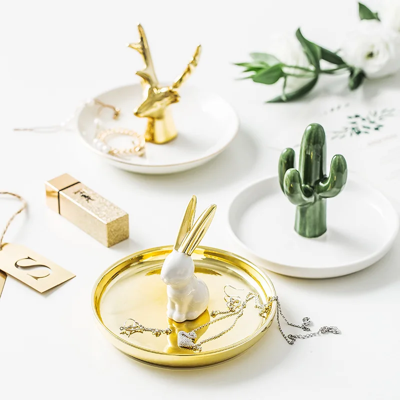 Rabbit jewelry plate dressing table storage plate ceramic handicrafts ornaments ring tray Nordic electric gold-plated gifts
Rabbit jewelry plate dressing table storage plate ceramic handicrafts ornaments ring tray Nordic electric gold-plated gifts