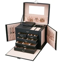 Custom Logo Travel Large Capacity Luxury Jewelry Box Black White Leather Storage Jewelry Boxe with Handle Case and Lock Design
Custom Logo Travel Large Capacity Luxury Jewelry Box Black White Leather Storage Jewelry Boxe with Handle Case and Lock Design