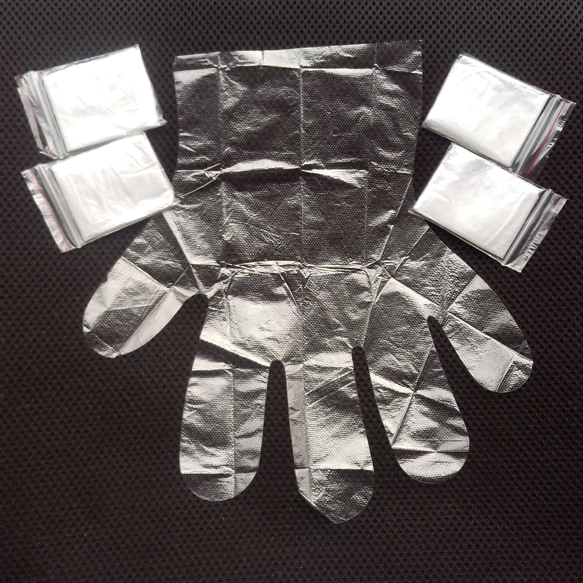 Disposable PE plastic 2pcs folded gloves in pair for hair salon 
Disposable PE plastic 2pcs folded gloves in pair for hair salon