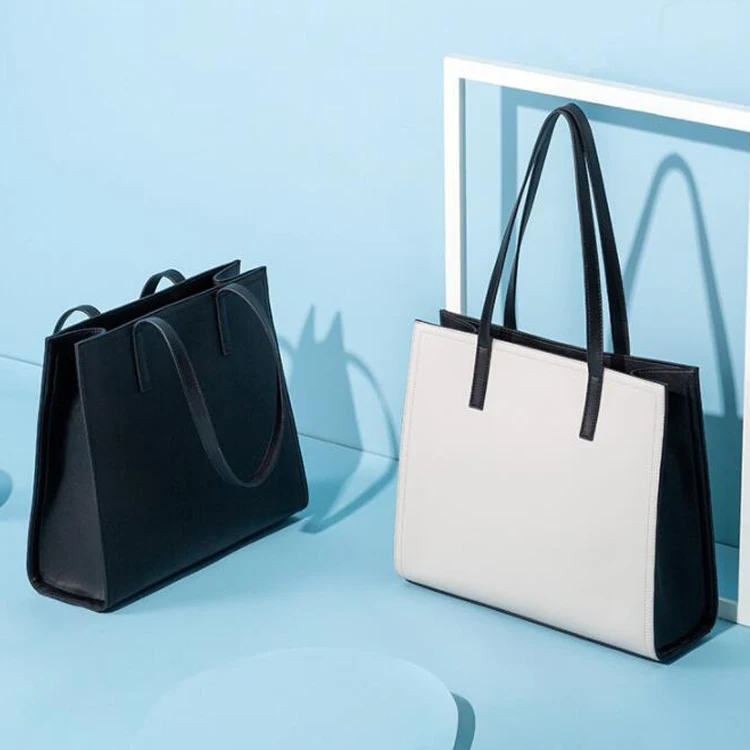 Female large capacity shoulder bag carrying genuine leather travel handbags tote bag for women, Black/off-white
Female large capacity shoulder bag carrying genuine leather travel handbags tote bag for women, Black/off-white