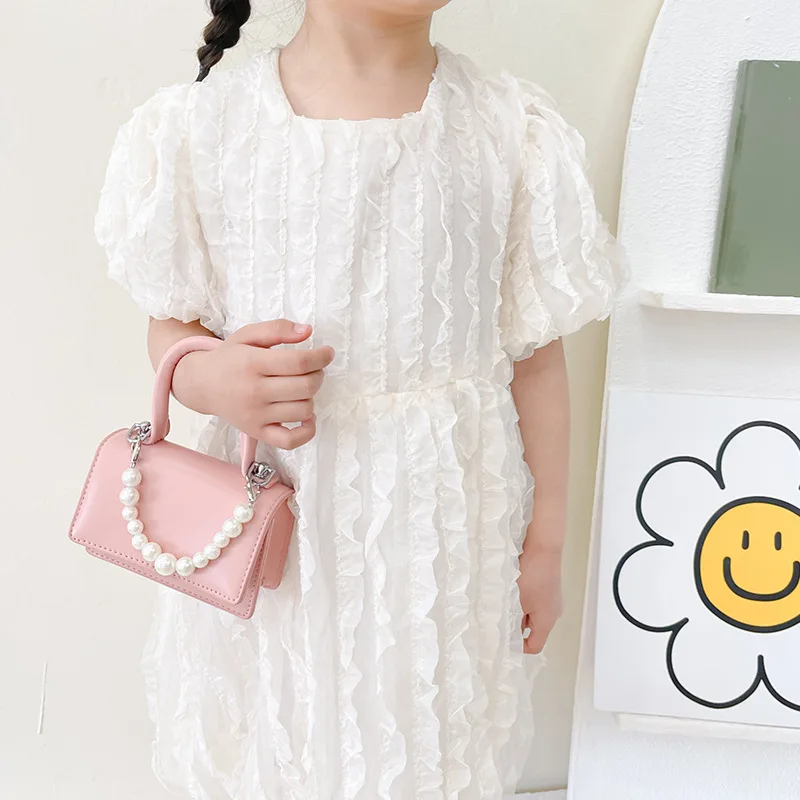 Ins new fashion Korean version solid color portable small square bag children's portable slung mini lipstick bag women's bag
Ins new fashion Korean version solid color portable small square bag children's portable slung mini lipstick bag women's bag