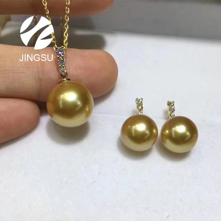 elegant natural golden color south sea pearls and diamonds jewelry set earrings and pendant with 18K gold design, Picture
elegant natural golden color south sea pearls and diamonds jewelry set earrings and pendant with 18K gold design, Picture