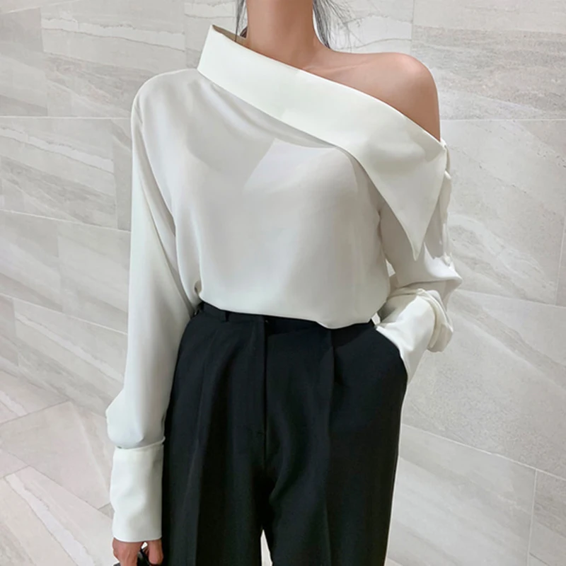 Spring Women's Tops Korean Chic Elegant Oblique Off Shoulder Loose Blouse All-Match Side Button Long Sleeve Solid Color Shirt
Spring Women's Tops Korean Chic Elegant Oblique Off Shoulder Loose Blouse All-Match Side Button Long Sleeve Solid Color Shirt
