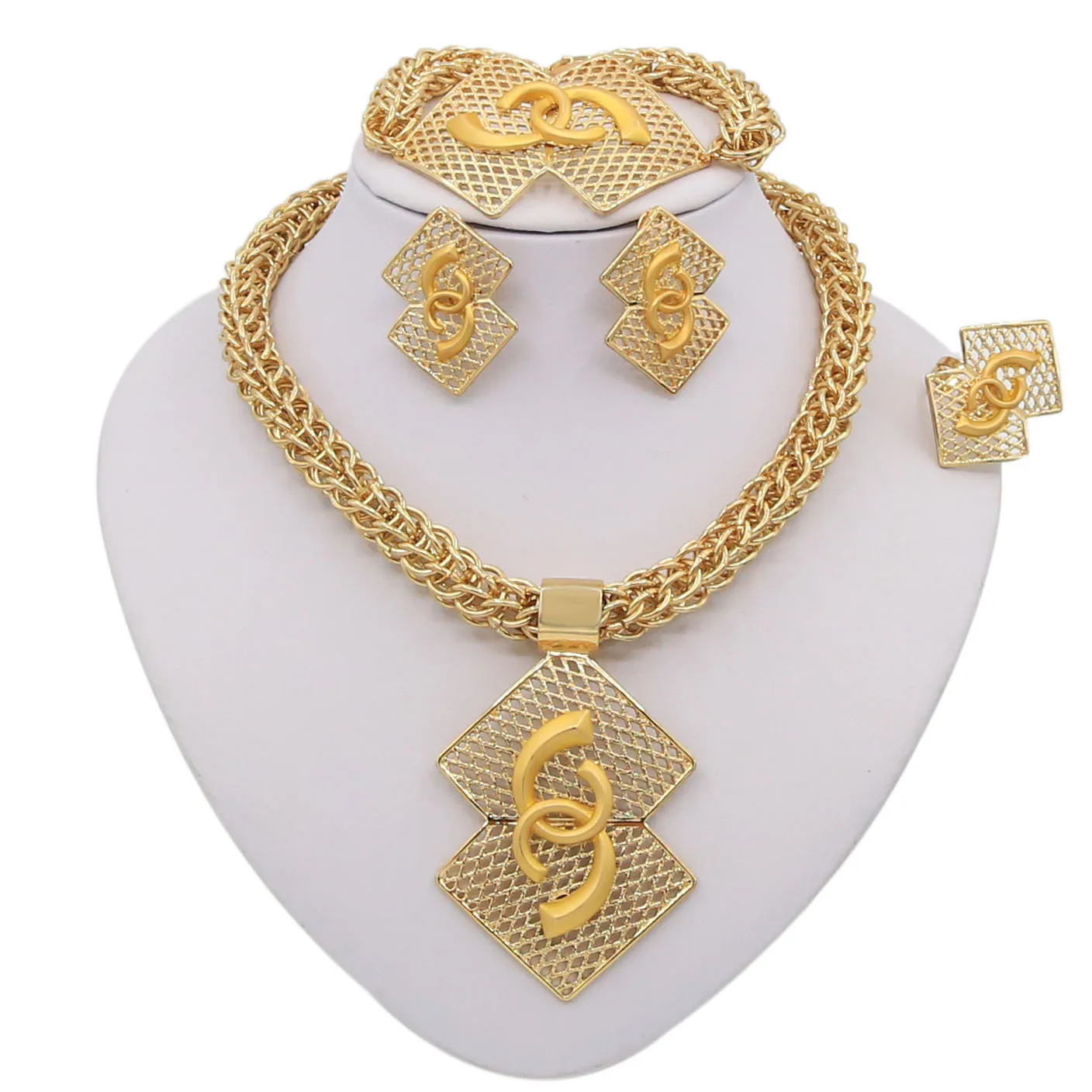 New Fashion Gold-plated Jewelry Set Thick Necklace Bracelet Earrings Ring Set Brazil Women's Matching Clothes Jewelry Sets
New Fashion Gold-plated Jewelry Set Thick Necklace Bracelet Earrings Ring Set Brazil Women's Matching Clothes Jewelry Sets