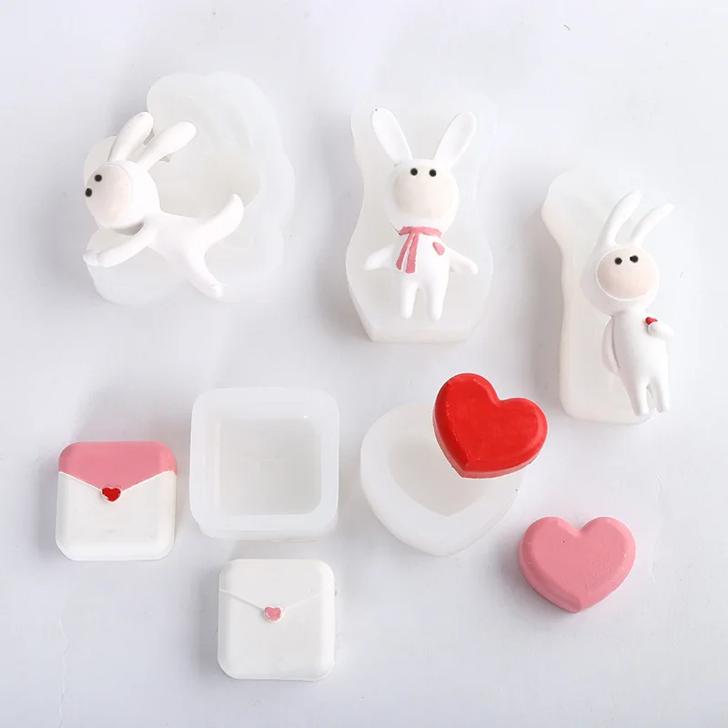 Customized cartoon rabbit love silicone DIY car aromatherapy ornaments decoration resin mold for craft, White
Customized cartoon rabbit love silicone DIY car aromatherapy ornaments decoration resin mold for craft, White