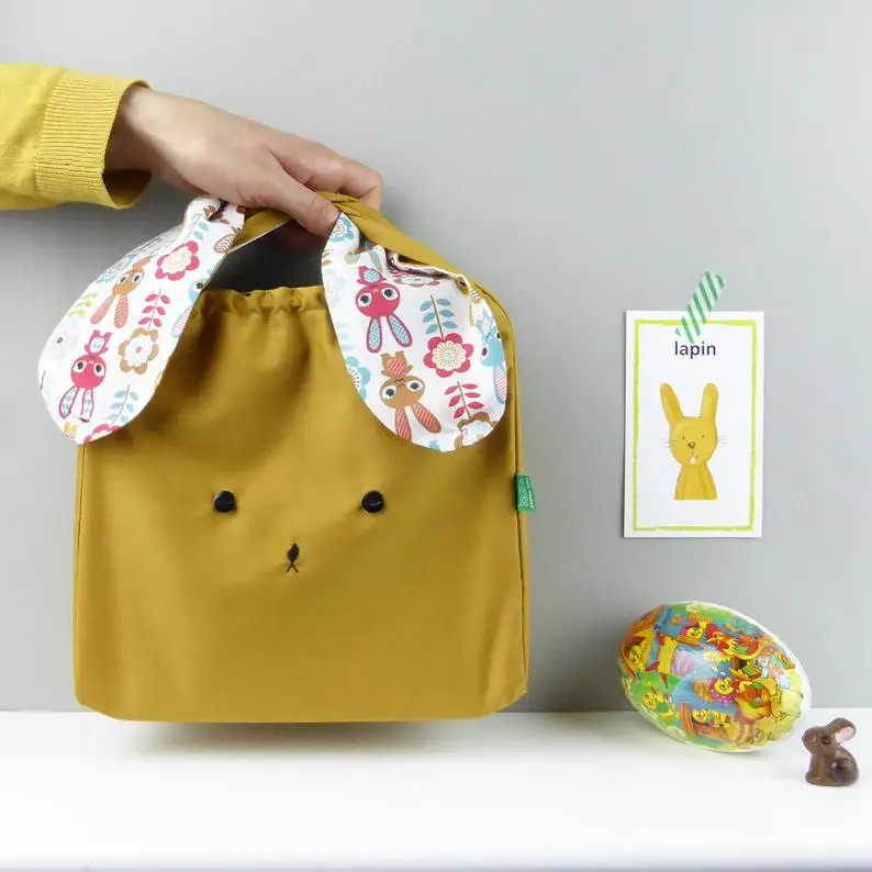 Handmade Bunny rabbit woodland fabric lunch bag retro scandi style messenger bag for children bag nursery and toddler
Handmade Bunny rabbit woodland fabric lunch bag retro scandi style messenger bag for children bag nursery and toddler