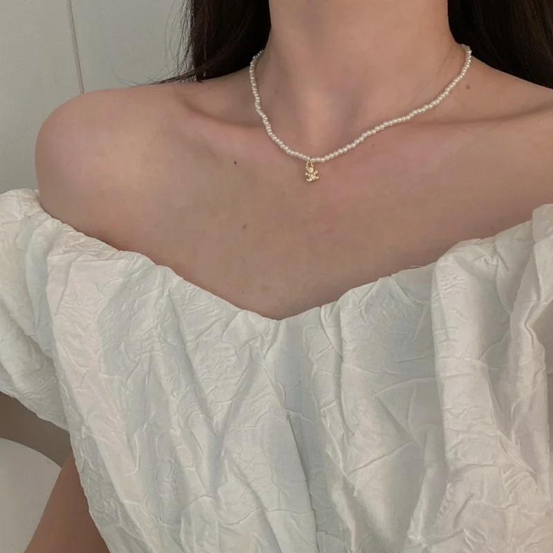 Korean new lovely bear design alloy real gold plated small white pearl bead fashion choker necklace for women jewelry, As the pic show
Korean new lovely bear design alloy real gold plated small white pearl bead fashion choker necklace for women jewelry, As the pic show