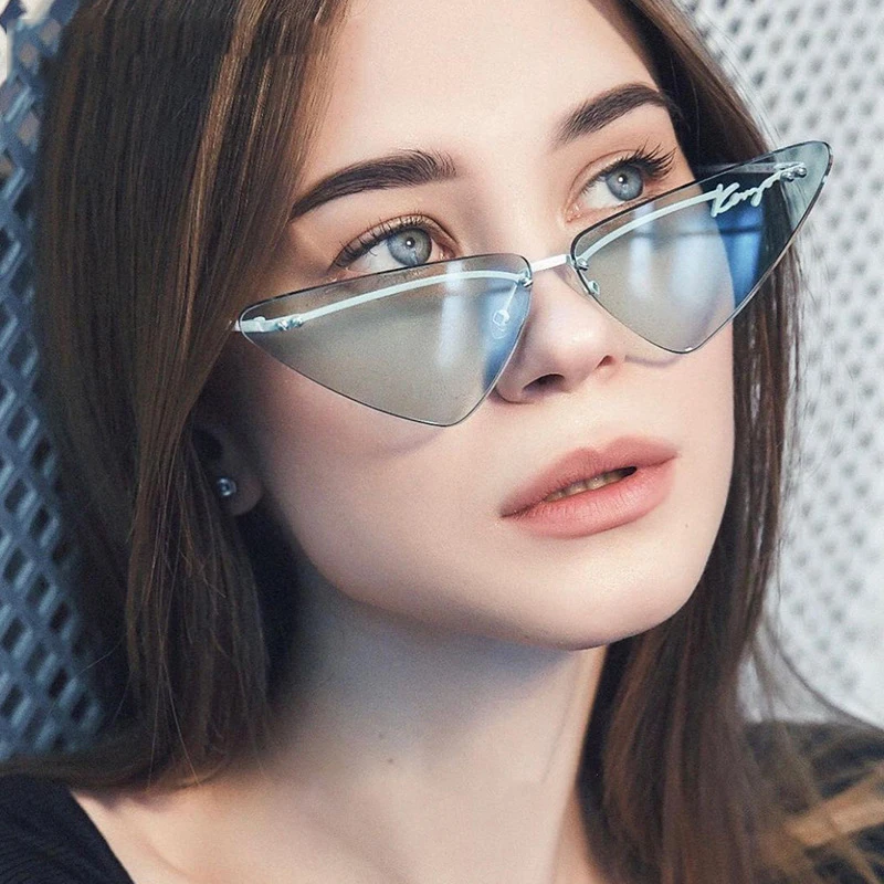 2022 New Fashion Rimless Cut-edge Cat Eye Sunglasses Personality Trend Candy Lens Small Triangular Sun Glasses For Women
2022 New Fashion Rimless Cut-edge Cat Eye Sunglasses Personality Trend Candy Lens Small Triangular Sun Glasses For Women
